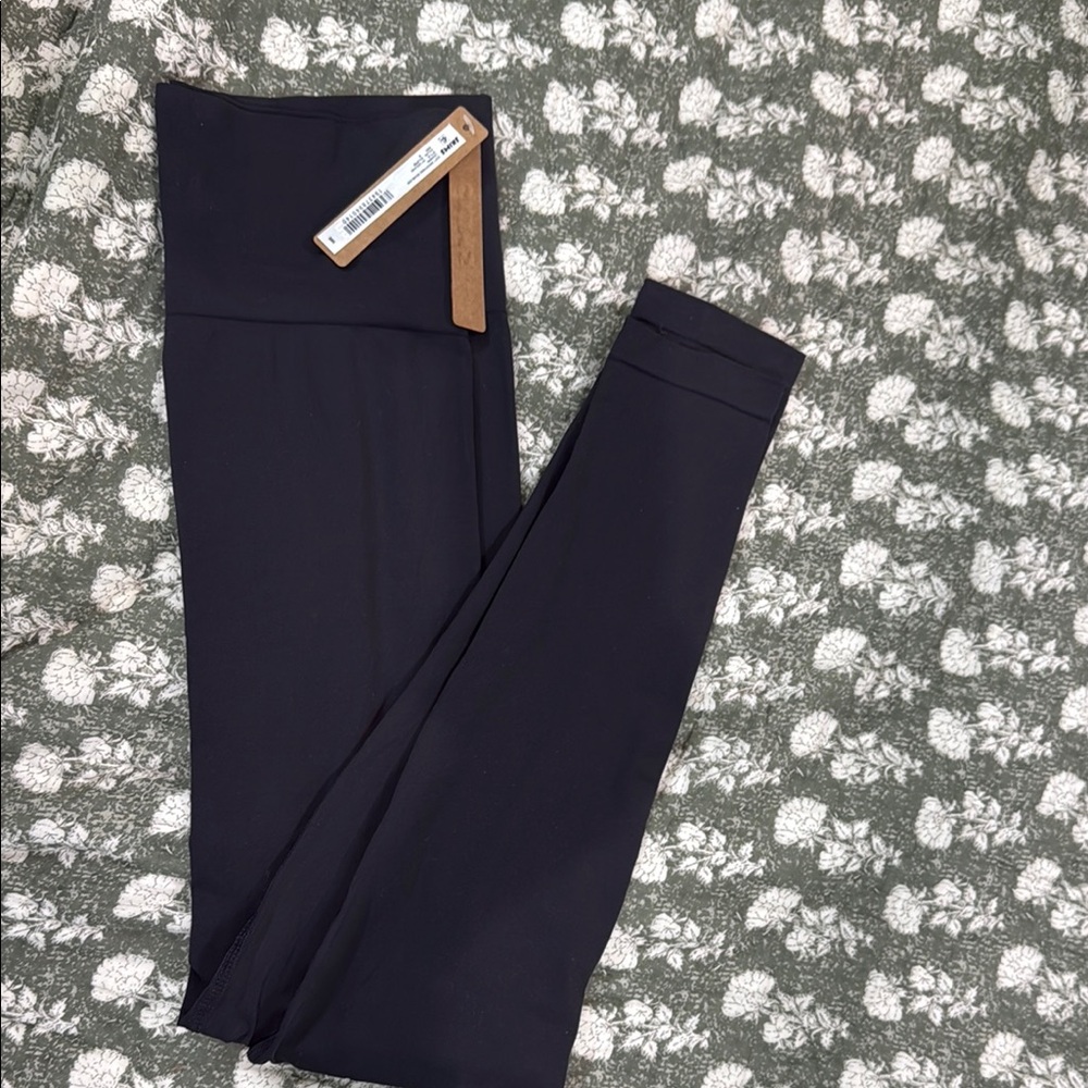 SKIMSBlack High-Waisted Leggings.
